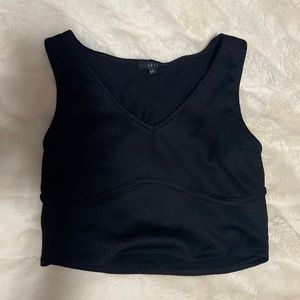 Brand - Iris. Bought at Below The Belt. Size Large. Black, fitted bust, crop top